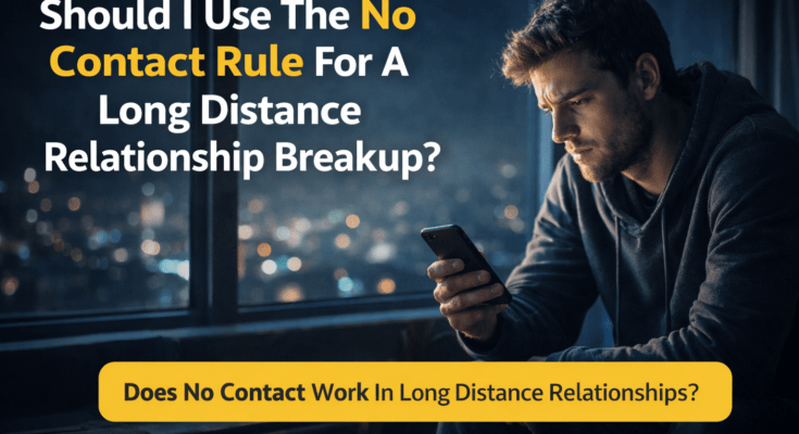 Person looking at phone after a long distance relationship breakup, illustrating whether the no contact rule works in long distance relationships.