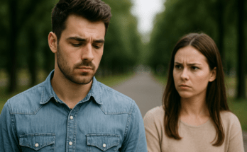Man looking ahead while a woman stands blurred in the background, representing emotional distance after a breakup.