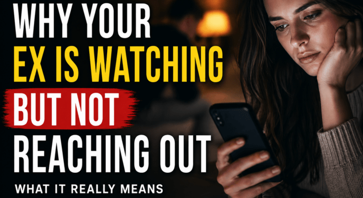 Woman checking her phone at night, symbolizing why an ex watches your social media but does not reach out after a breakup